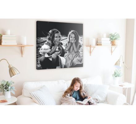 Square canvas photo print on wall with two girls in photo